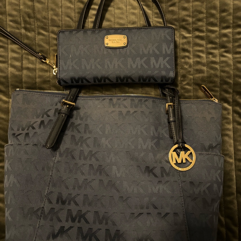 Navy blue fabric Micheal Kors tote and wallet/wristlet